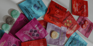 Assorted DocC Gemmy cannabis gummy pouches in multiple colors arranged in a flat lay.
